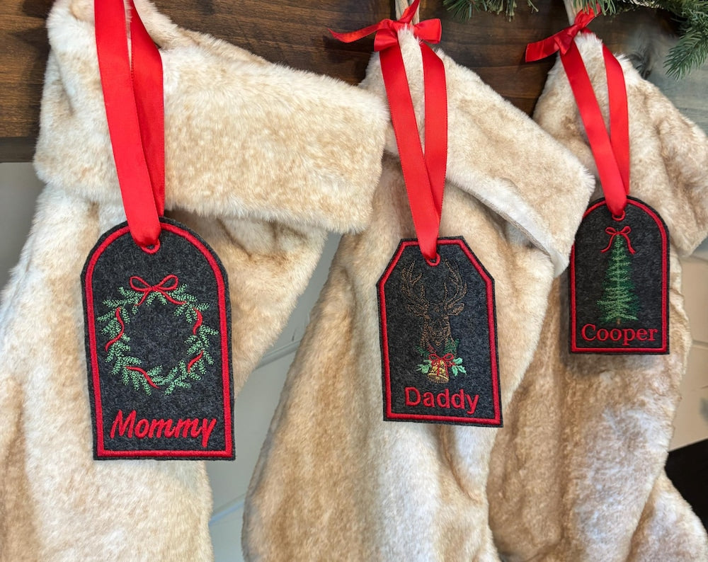 Three beige stockings with red decorative tags